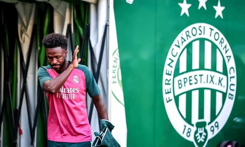 Player in Real Madrid kit walking past club logo Player in Real Madrid kit walking past club logo