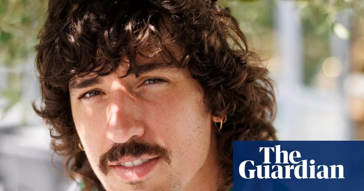 Close-up portrait of a man with curly hair Close-up portrait of a man with curly hair