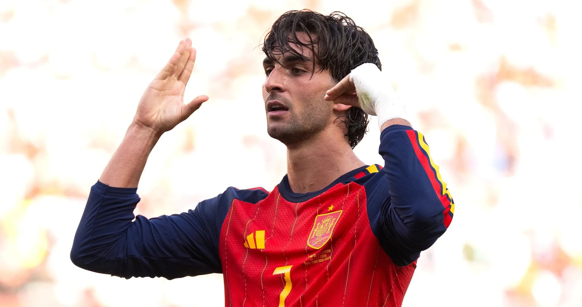 Player gesturing during a match in Spain jersey Player gesturing during a match in Spain jersey