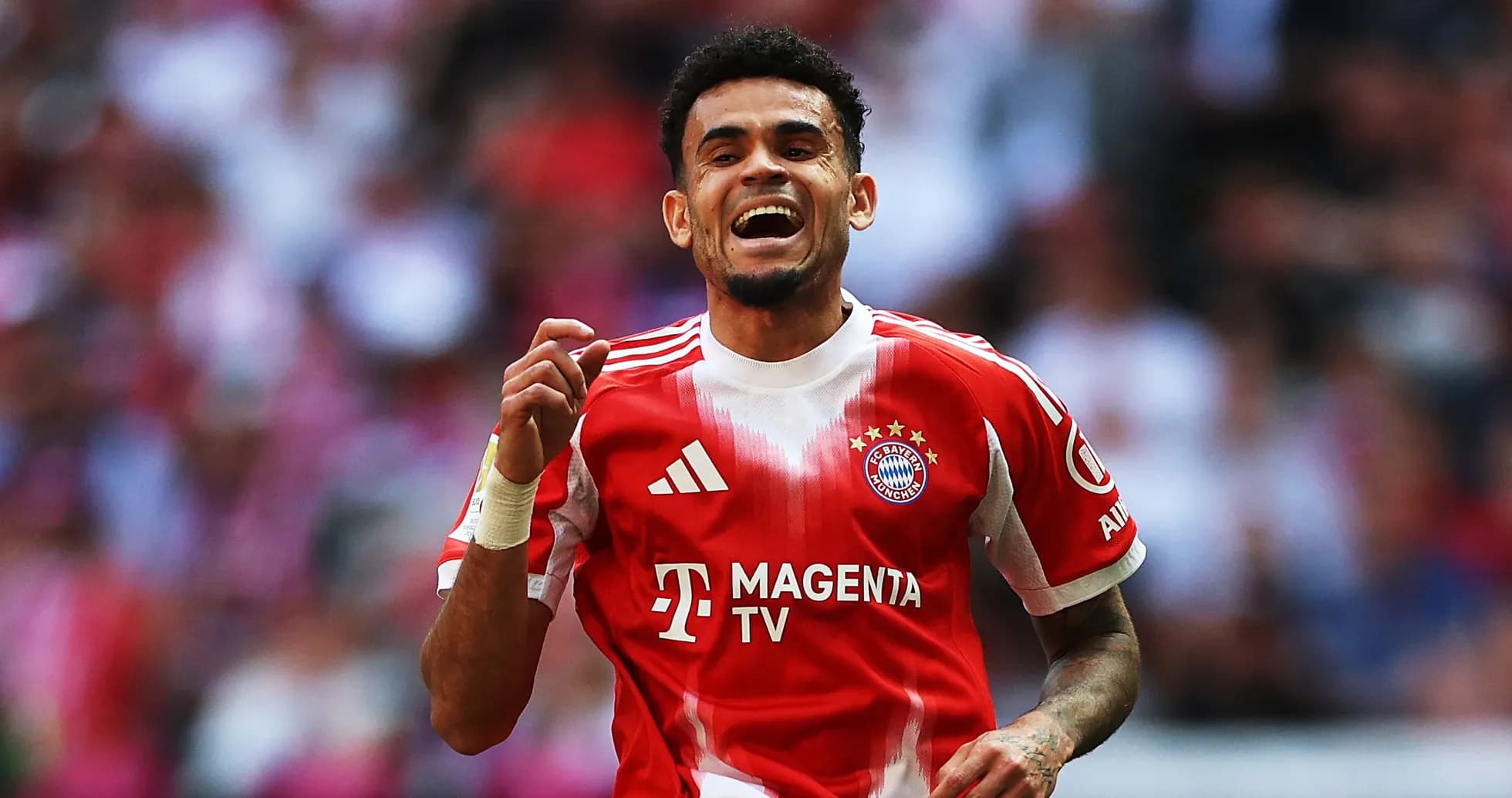 Player celebrating a goal in Bayern Munich kit Player celebrating a goal in Bayern Munich kit