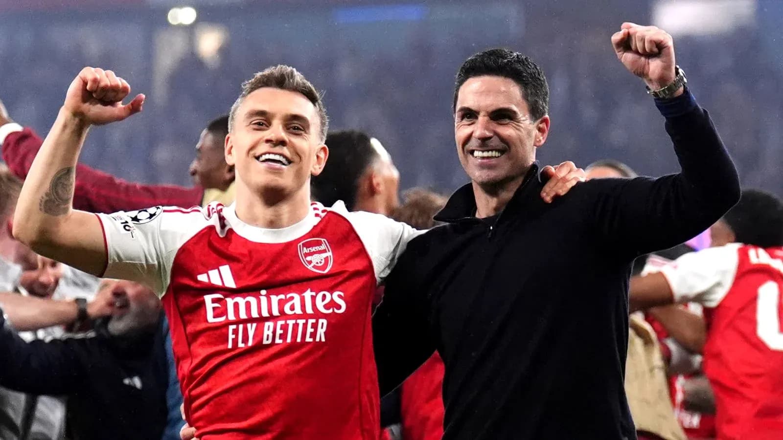 Arsenal player and manager celebrating together Arsenal player and manager celebrating together