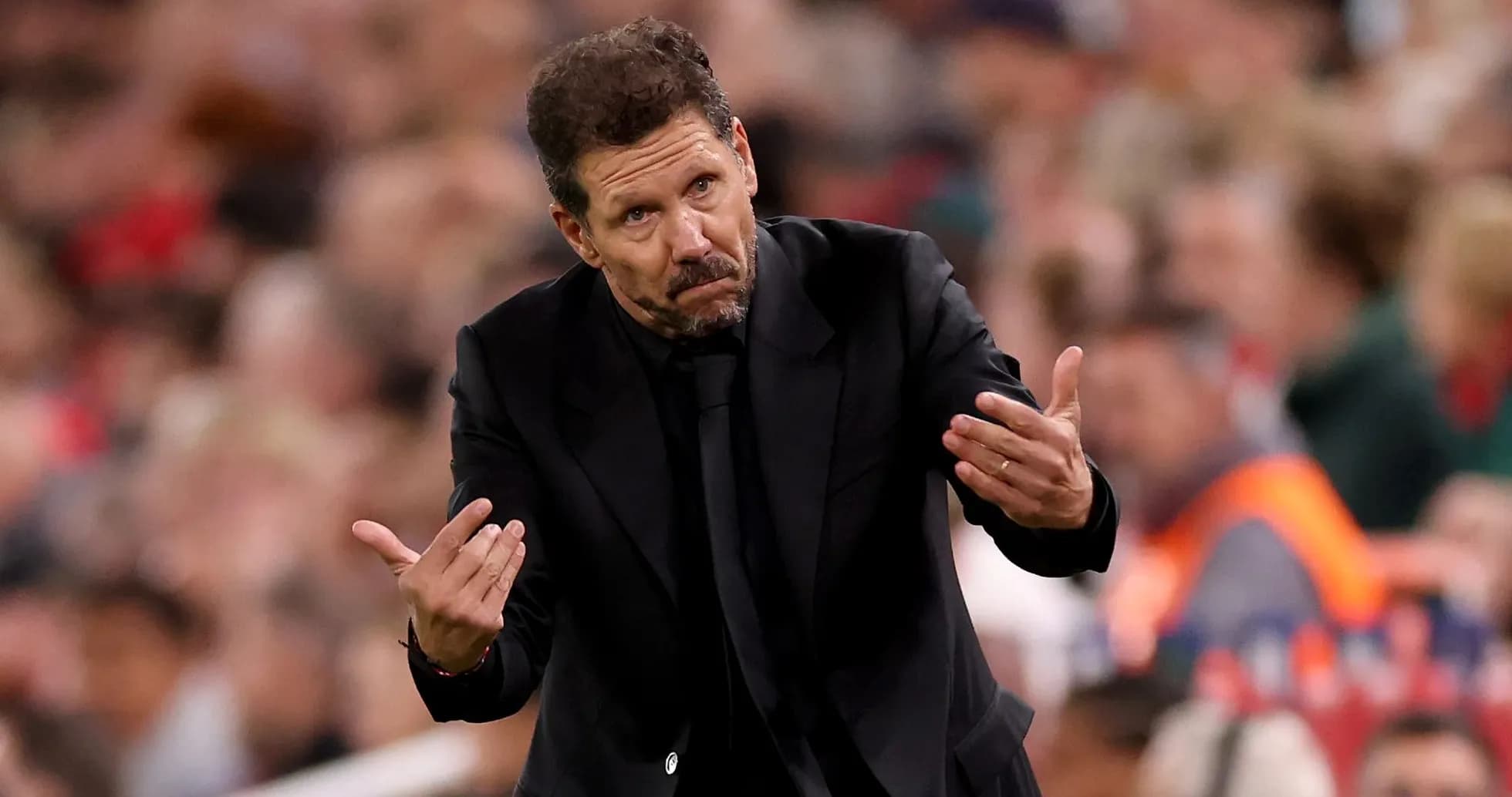 Manager gesturing during a match on the sidelines Manager gesturing during a match on the sidelines