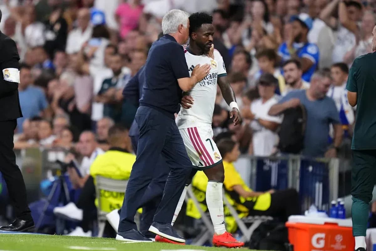 Coach discussing with player during match substitution Coach discussing with player during match substitution