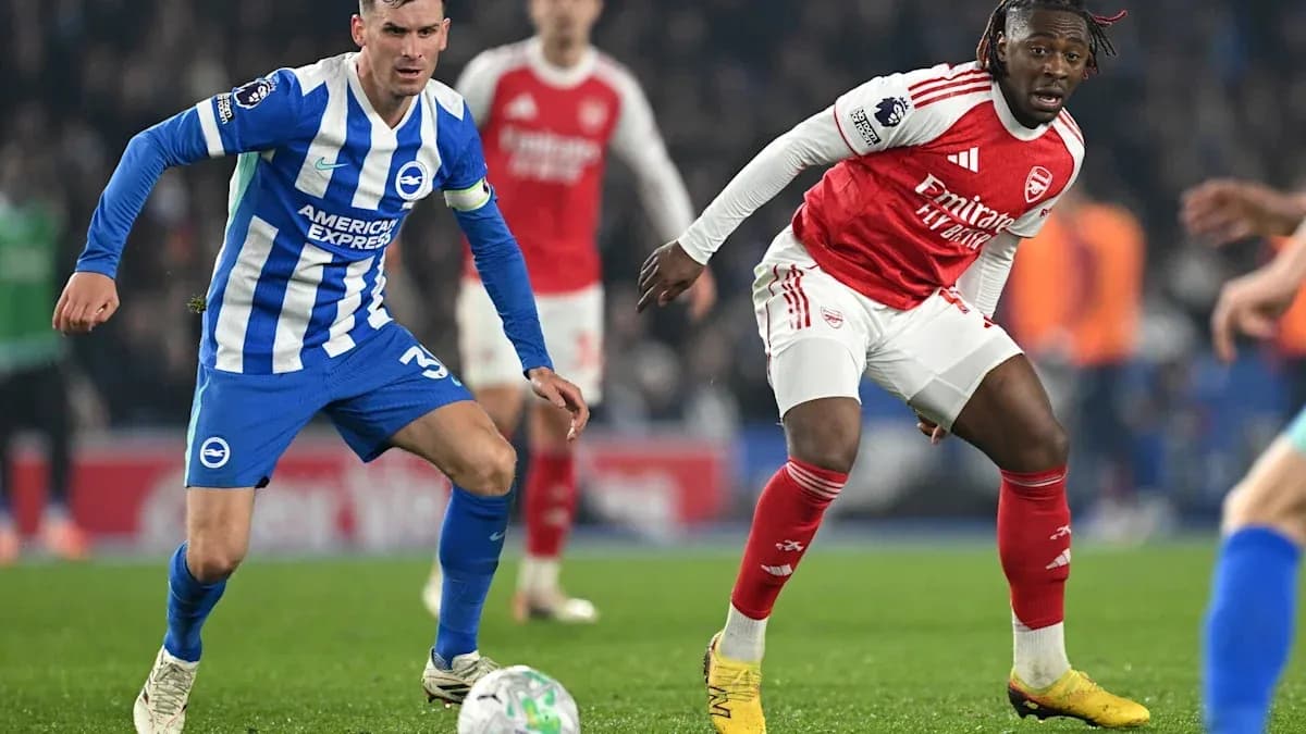Brighton and Arsenal players contesting the ball Brighton and Arsenal players contesting the ball