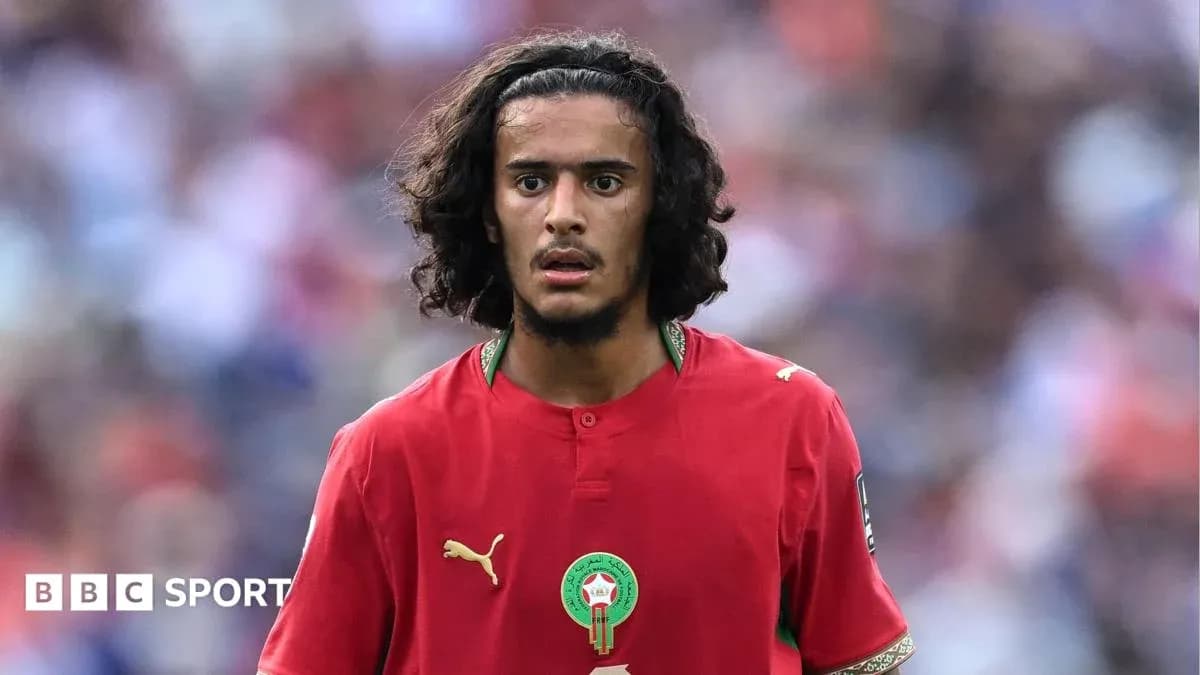 Moroccan player in red jersey during match Moroccan player in red jersey during match
