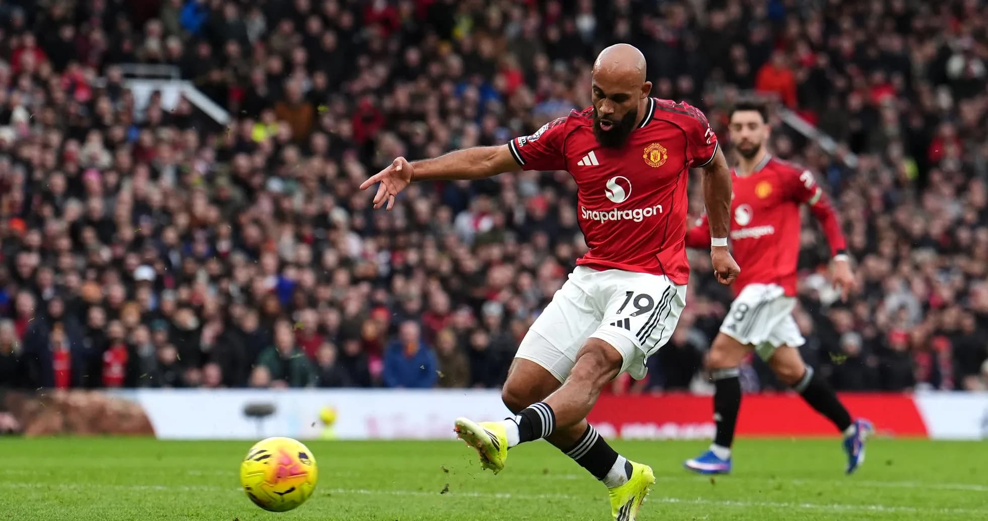 Player kicking the ball during Manchester derby Player kicking the ball during Manchester derby