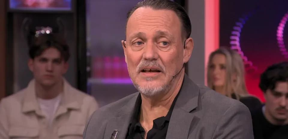 Man speaking during a talk show segment Man speaking during a talk show segment