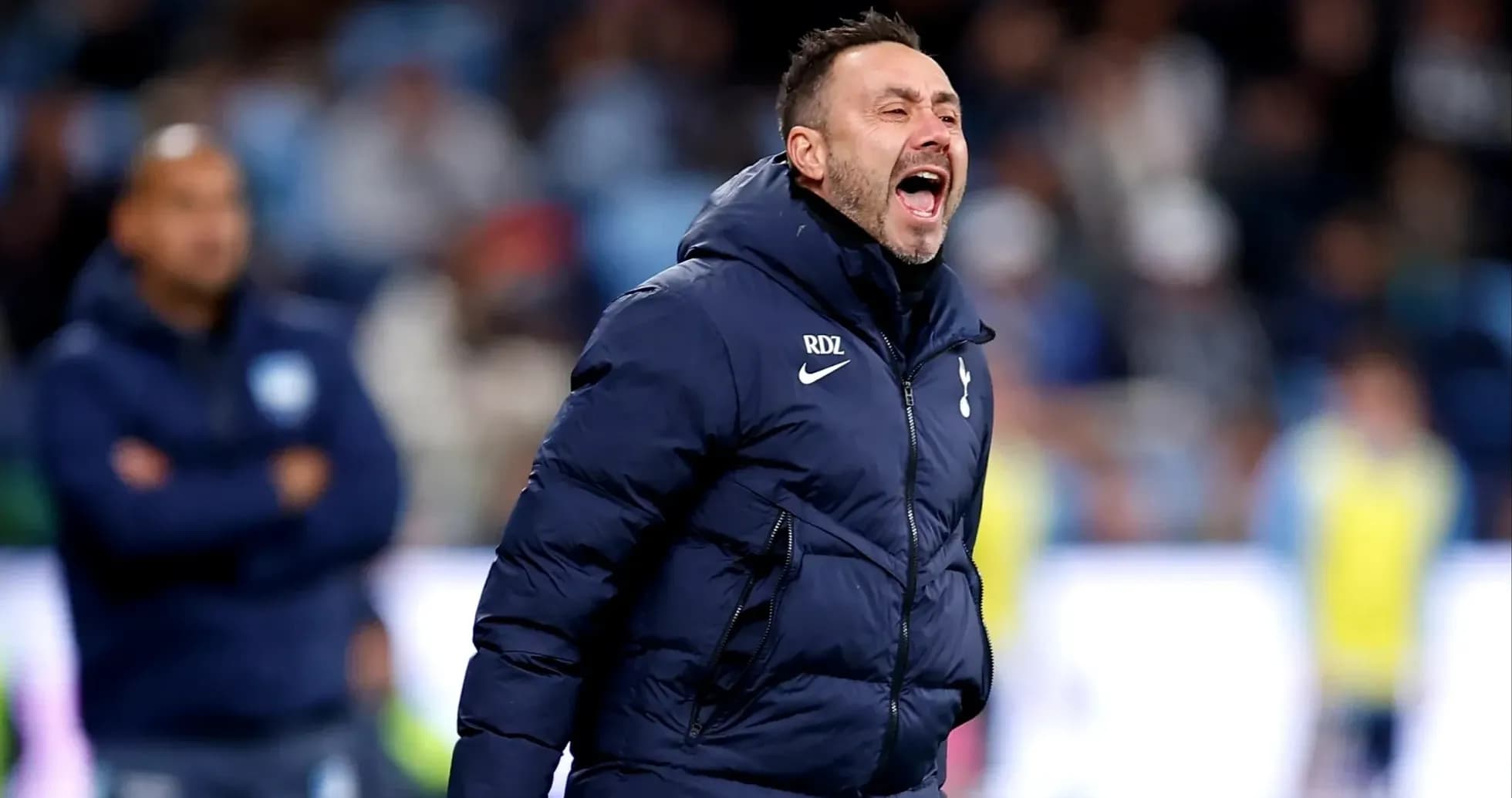 Coach shouting instructions during a football match Coach shouting instructions during a football match
