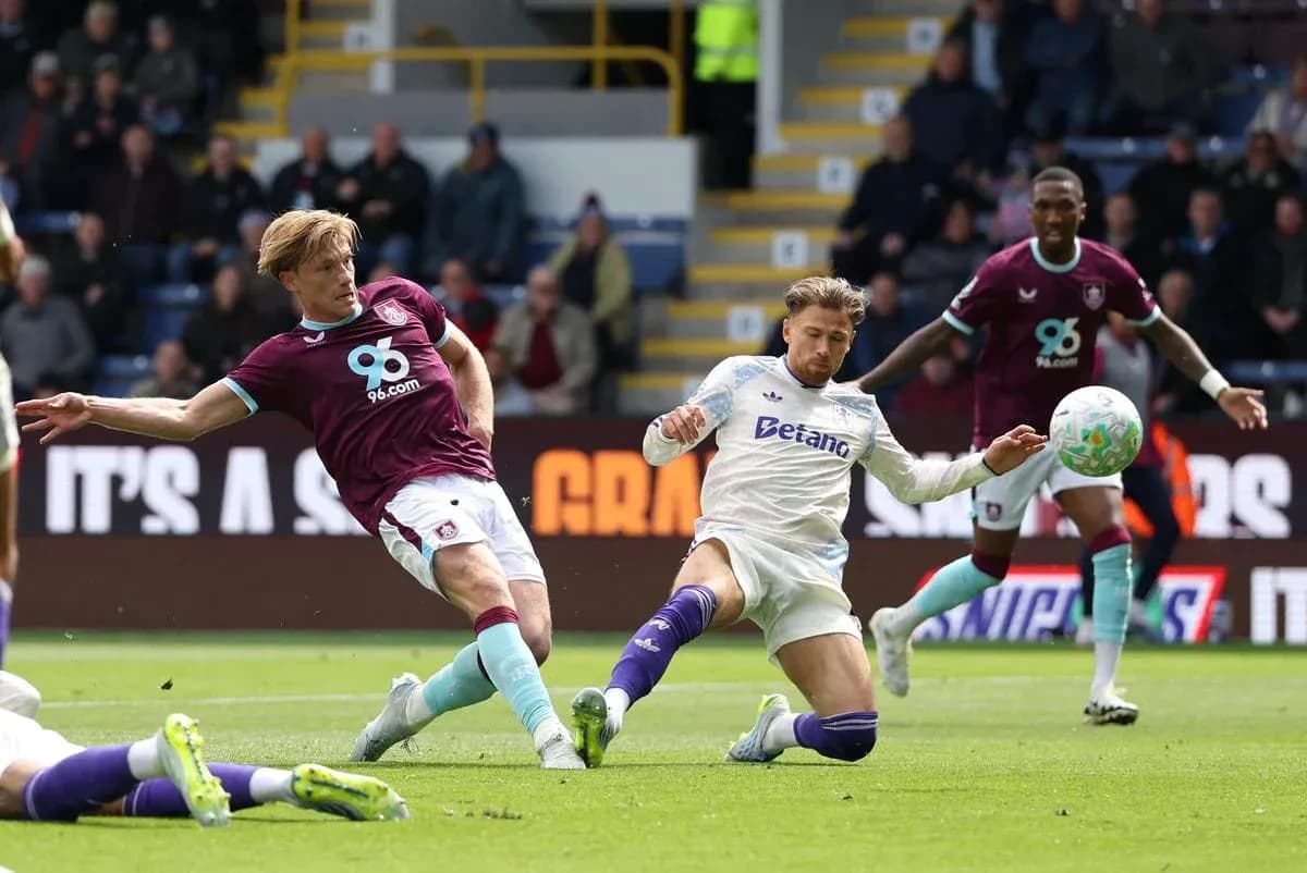 Burnley player challenges Aston Villa opponent Burnley player challenges Aston Villa opponent