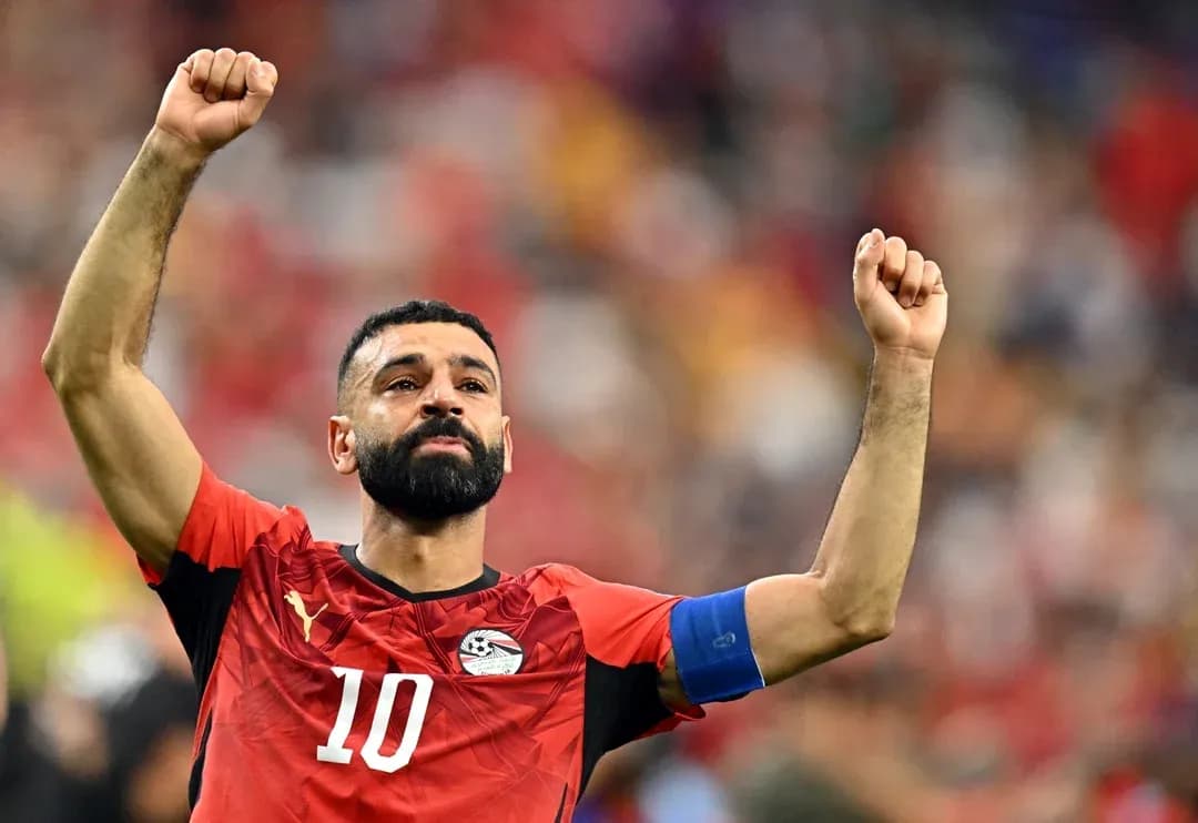 Player celebrating with raised fists during match Player celebrating with raised fists during match