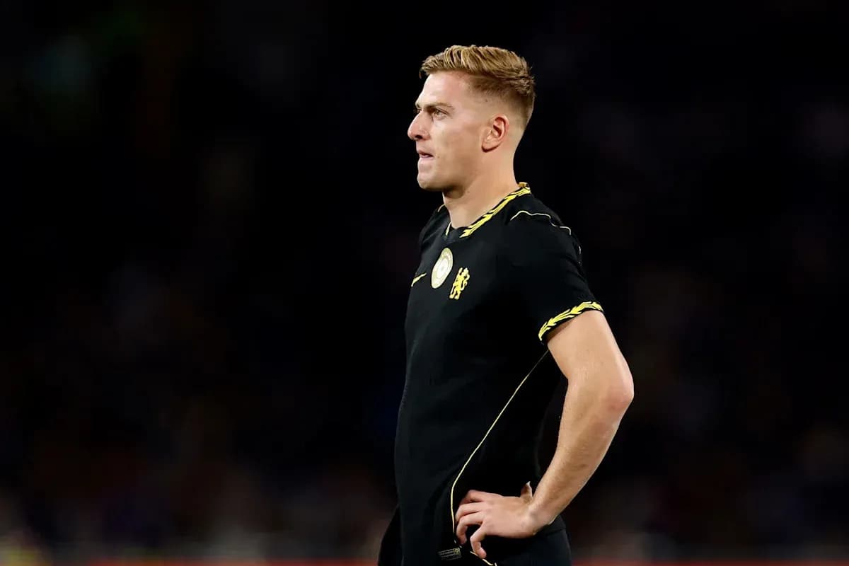 Player in black jersey standing during match Player in black jersey standing during match