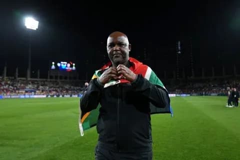 Coach wearing South African flag on shoulders Coach wearing South African flag on shoulders