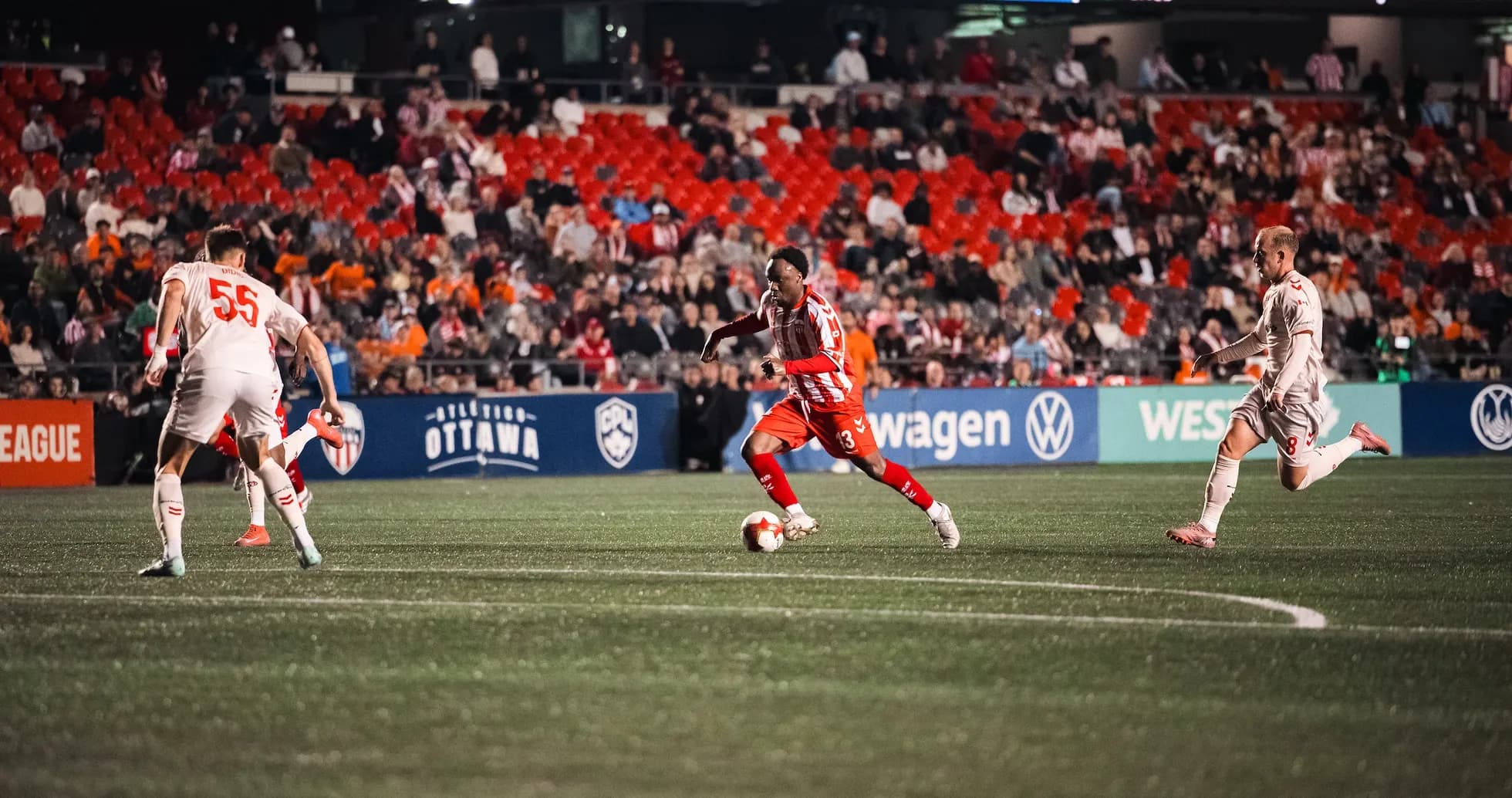 Player dribbling the ball during match Player dribbling the ball during match