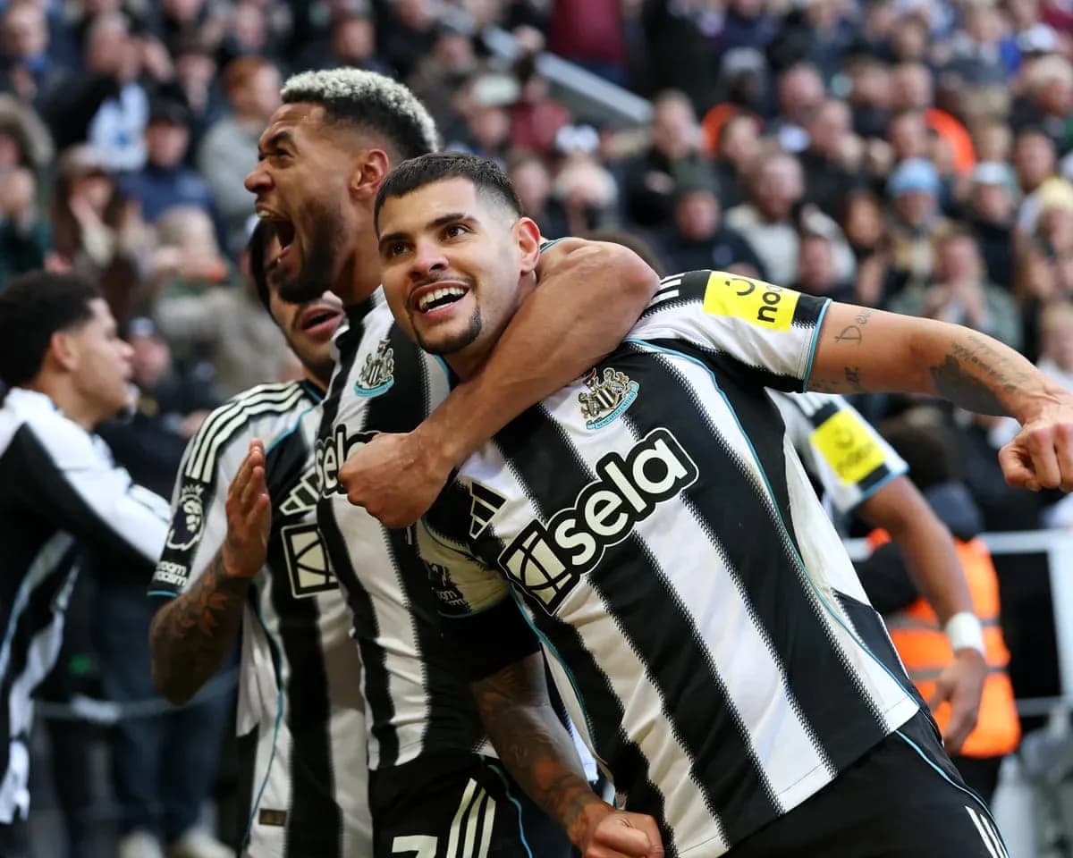 Newcastle players celebrating a goal Newcastle players celebrating a goal