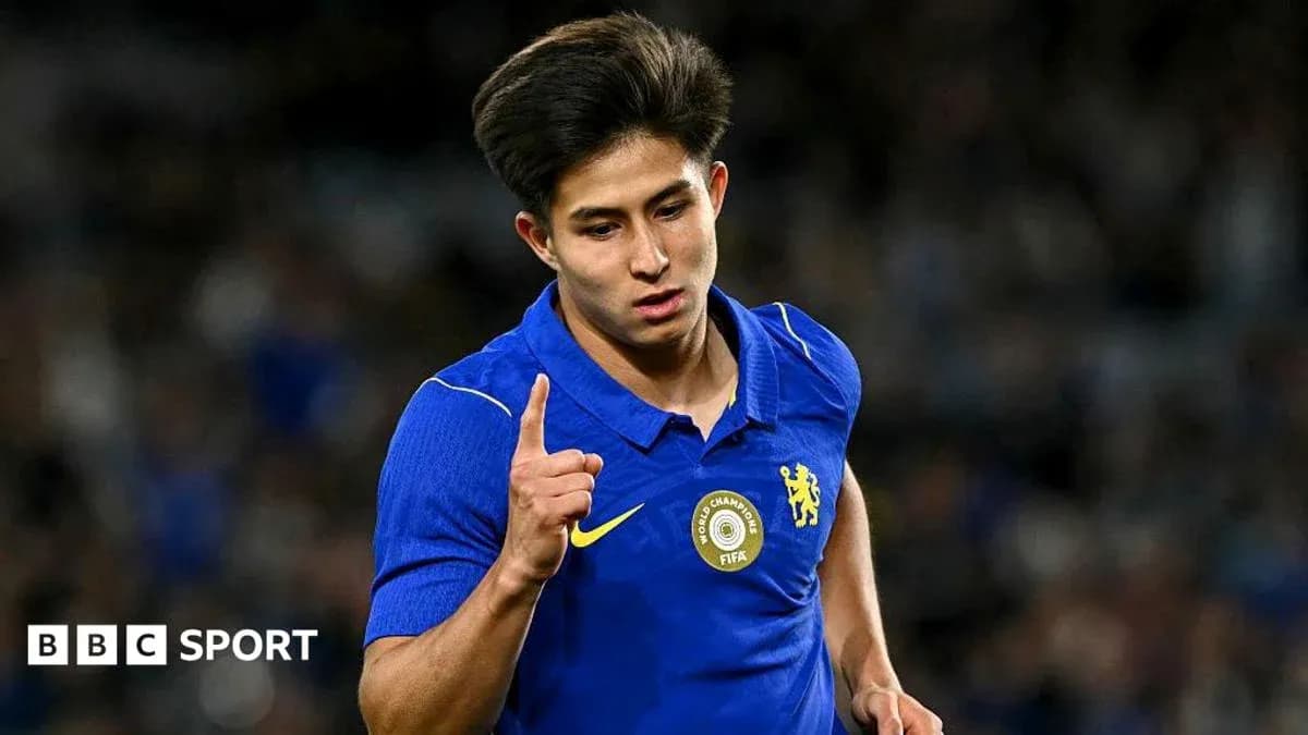 Player in blue jersey celebrating during match Player in blue jersey celebrating during match