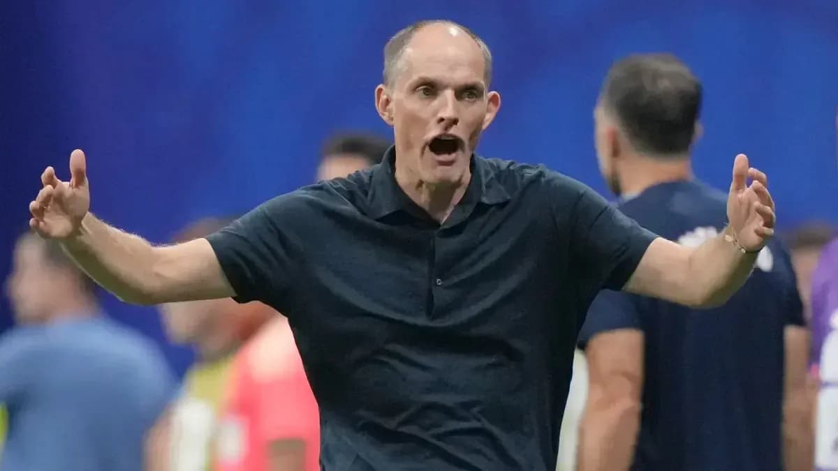 Coach gesturing during a match on the sideline Coach gesturing during a match on the sideline