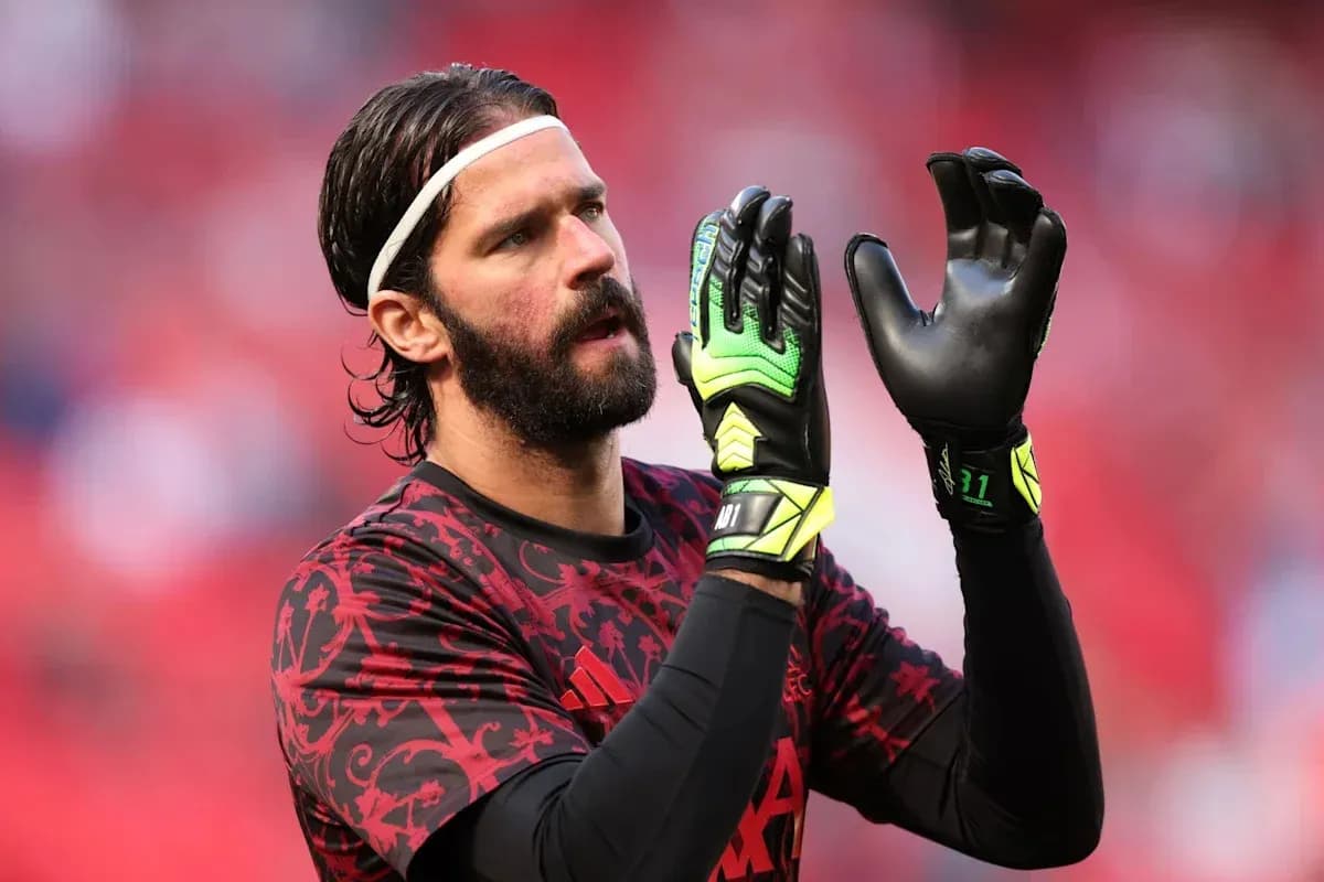 Goalkeeper preparing with gloves before the match Goalkeeper preparing with gloves before the match