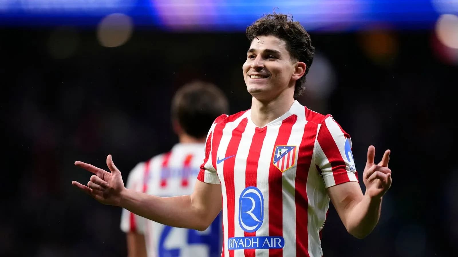 Atletico Madrid player celebrating a goal Atletico Madrid player celebrating a goal