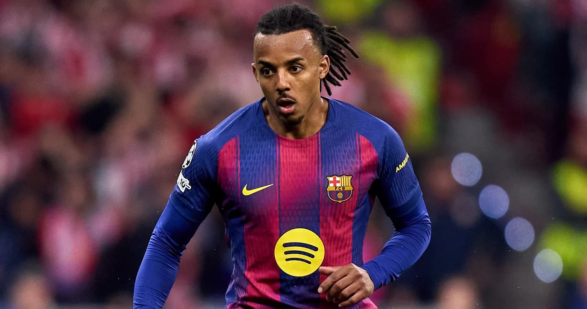 Player in FC Barcelona jersey running on field Player in FC Barcelona jersey running on field