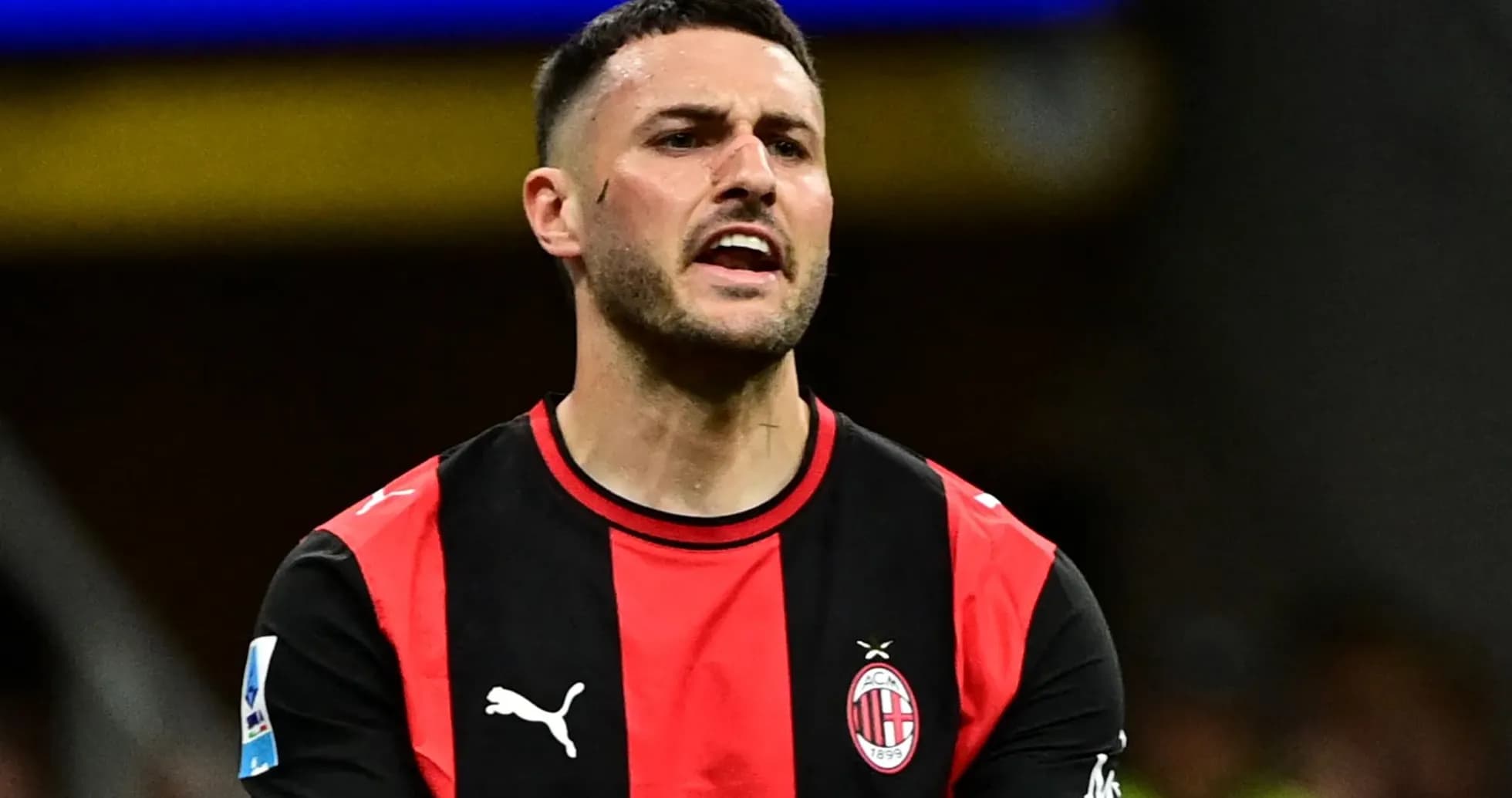Player in AC Milan kit reacting during match Player in AC Milan kit reacting during match