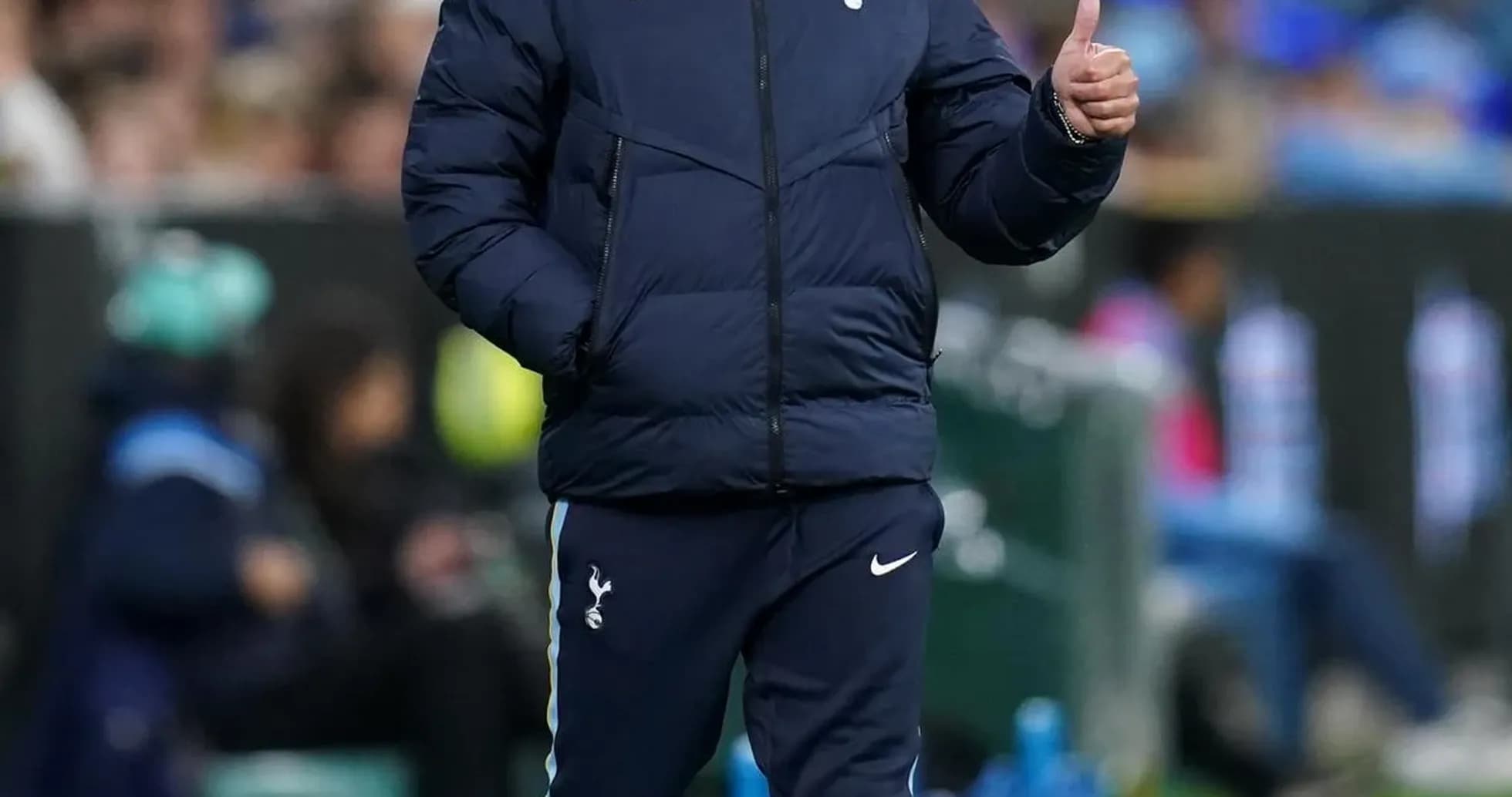 Coach gesturing during a match on the sideline Coach gesturing during a match on the sideline