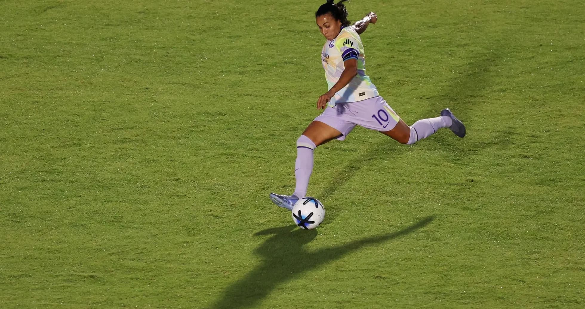 Player kicking the ball during match action Player kicking the ball during match action