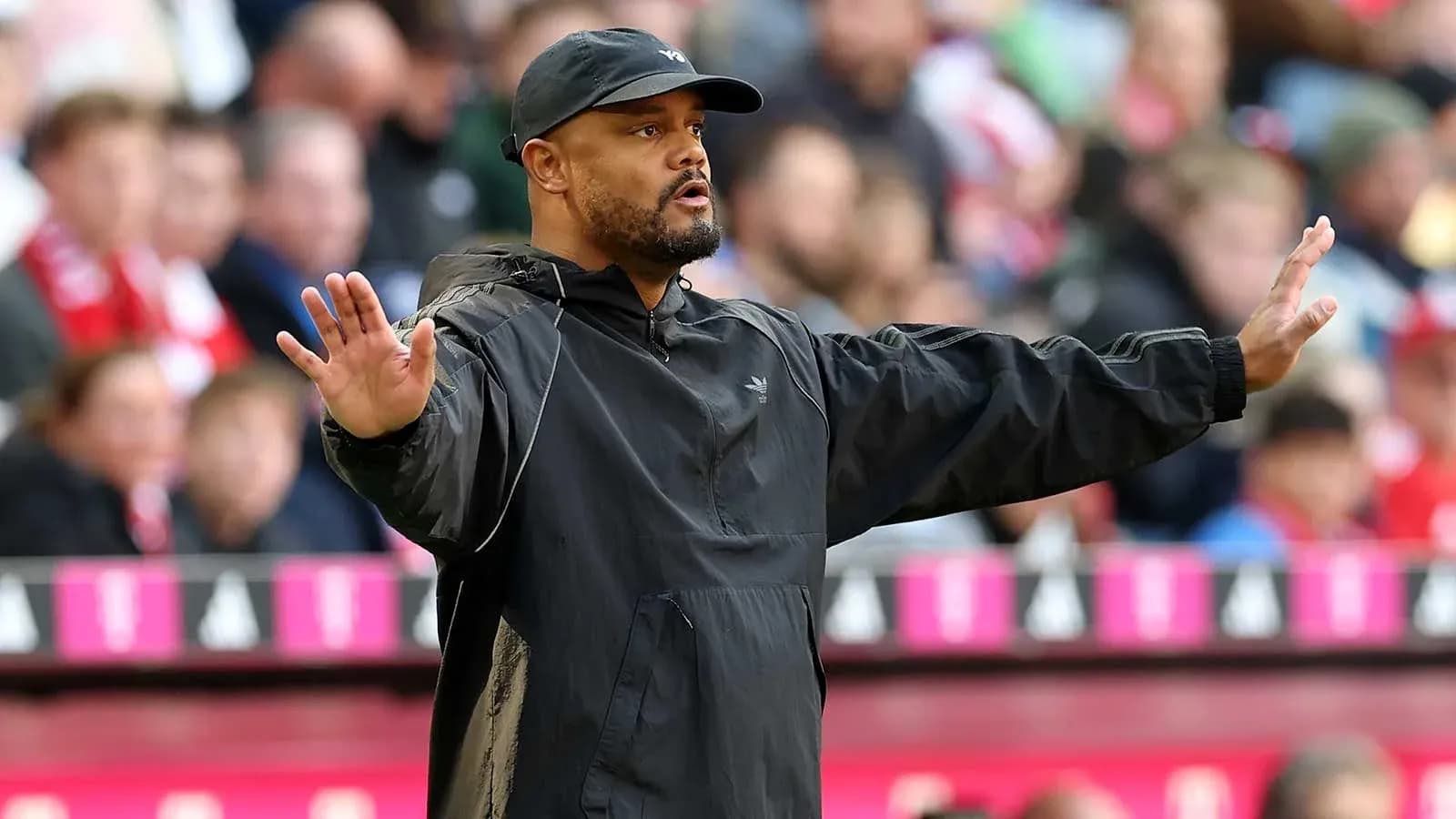 Coach gesturing from the sideline during match Coach gesturing from the sideline during match