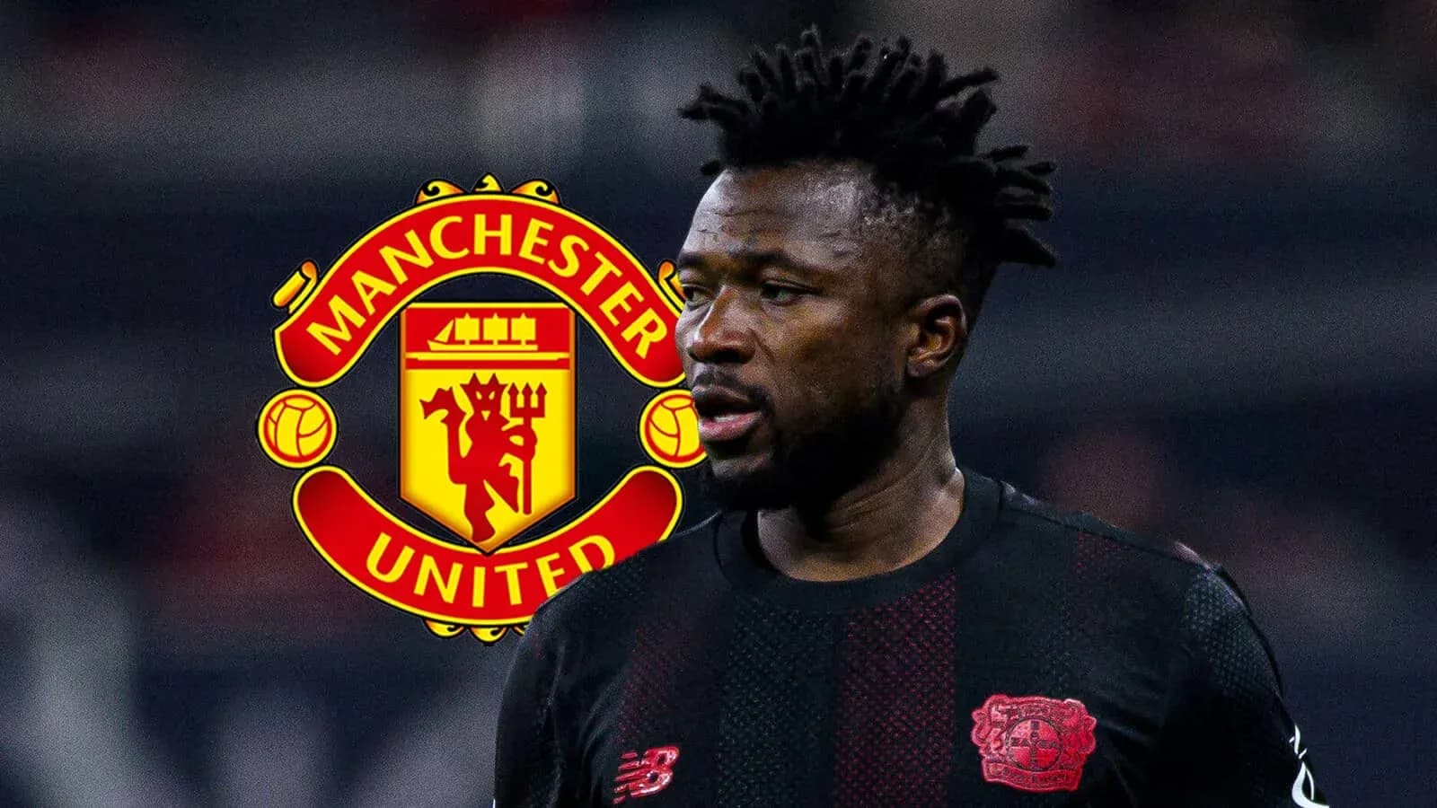 Player in black kit with Manchester United logo background Player in black kit with Manchester United logo background