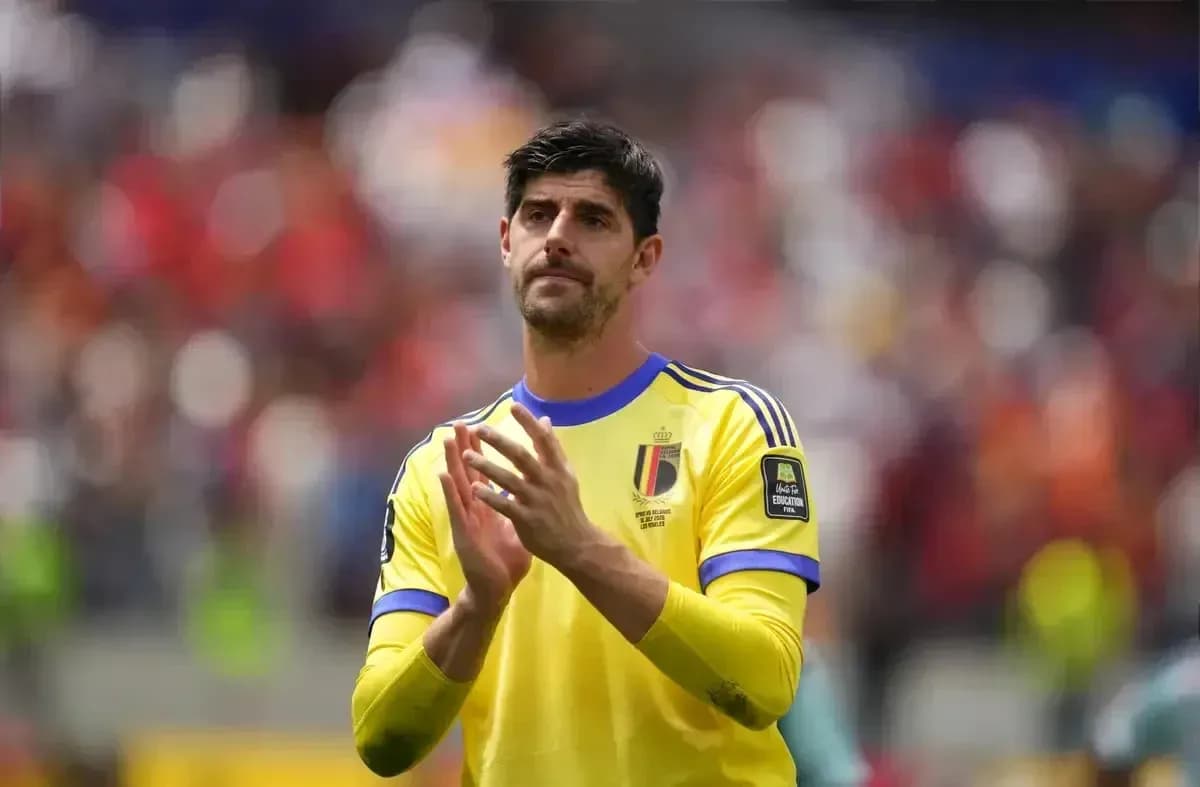 Goalkeeper in yellow jersey clapping to fans Goalkeeper in yellow jersey clapping to fans