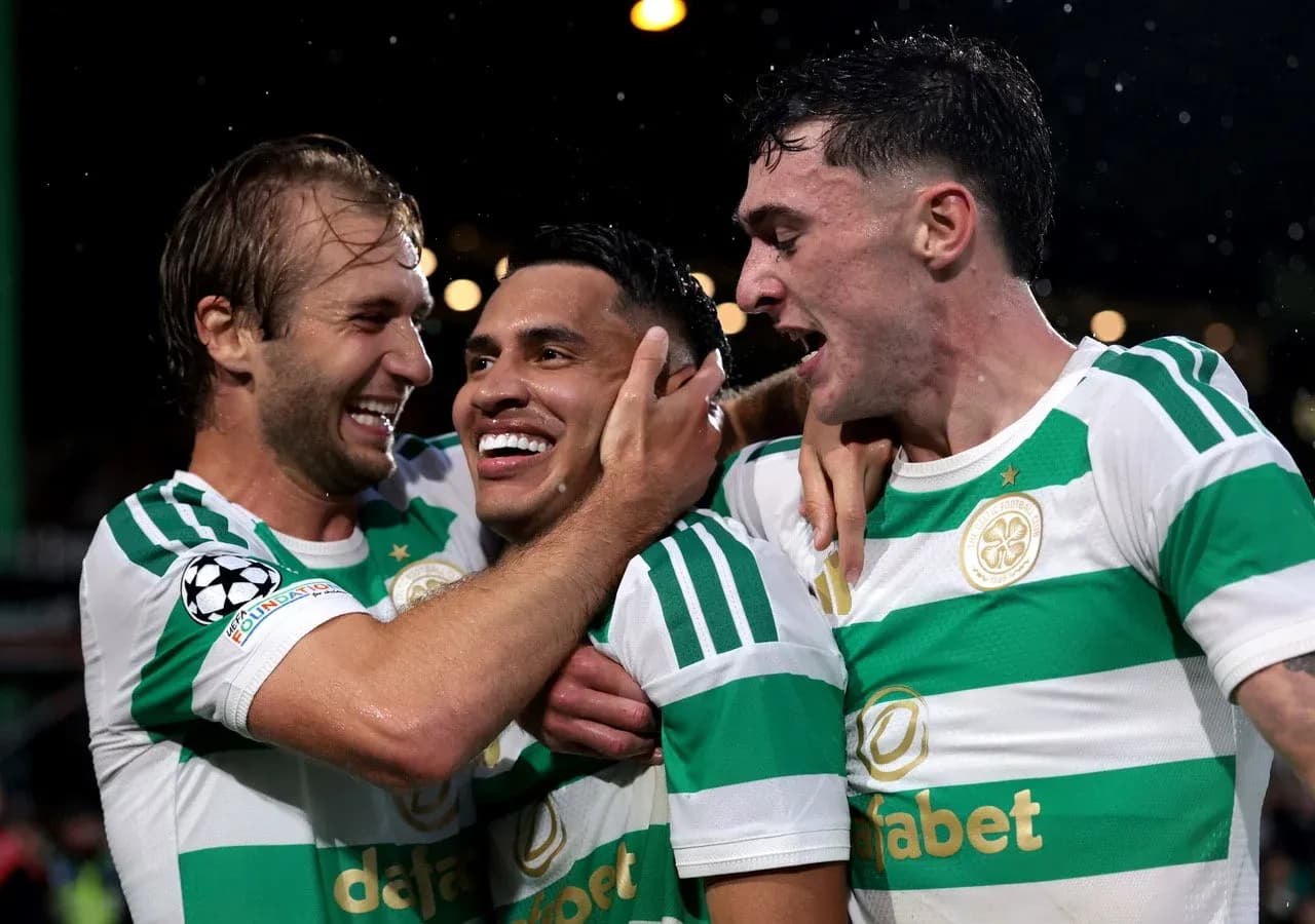 Celtic players celebrating a goal during match Celtic players celebrating a goal during match