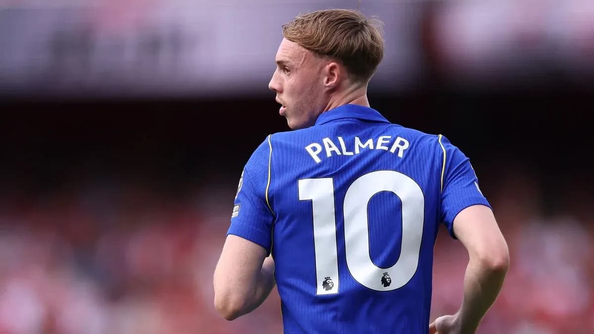 Player wearing blue jersey with number 10 Player wearing blue jersey with number 10
