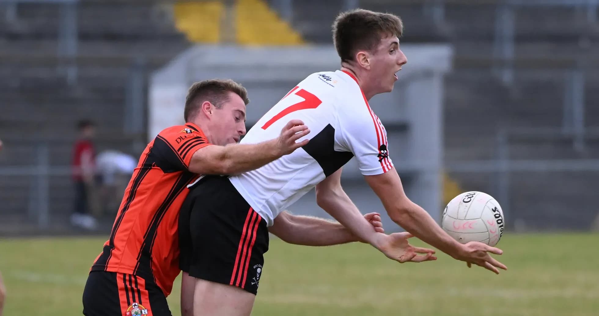 Two players competing for possession of the ball Two players competing for possession of the ball