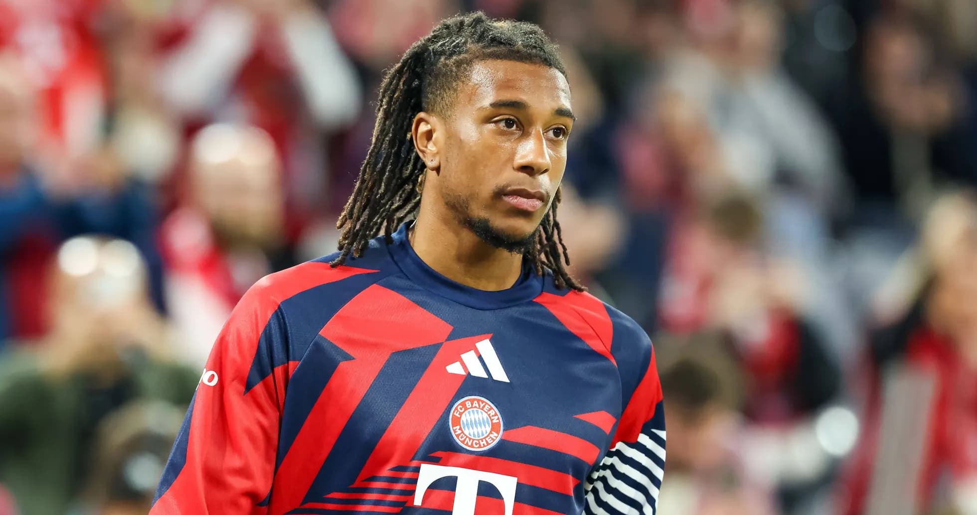 Bayern Munich player in team jersey on field Bayern Munich player in team jersey on field