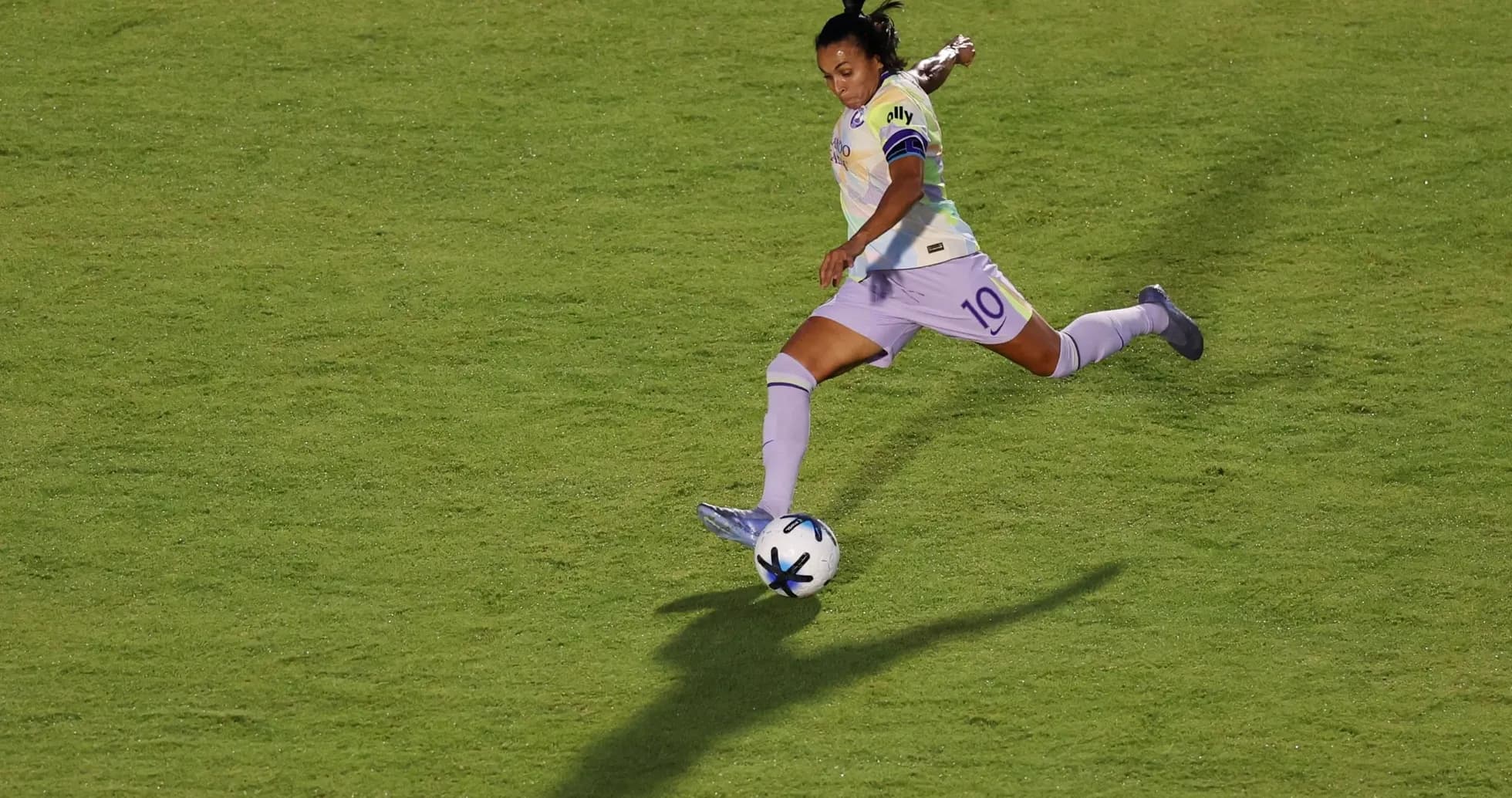 Player kicking ball during NWSL match Player kicking ball during NWSL match