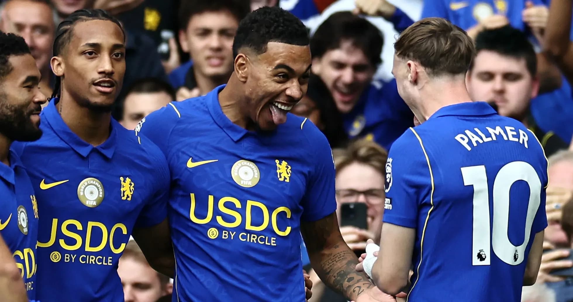 Chelsea players celebrating during a match Chelsea players celebrating during a match