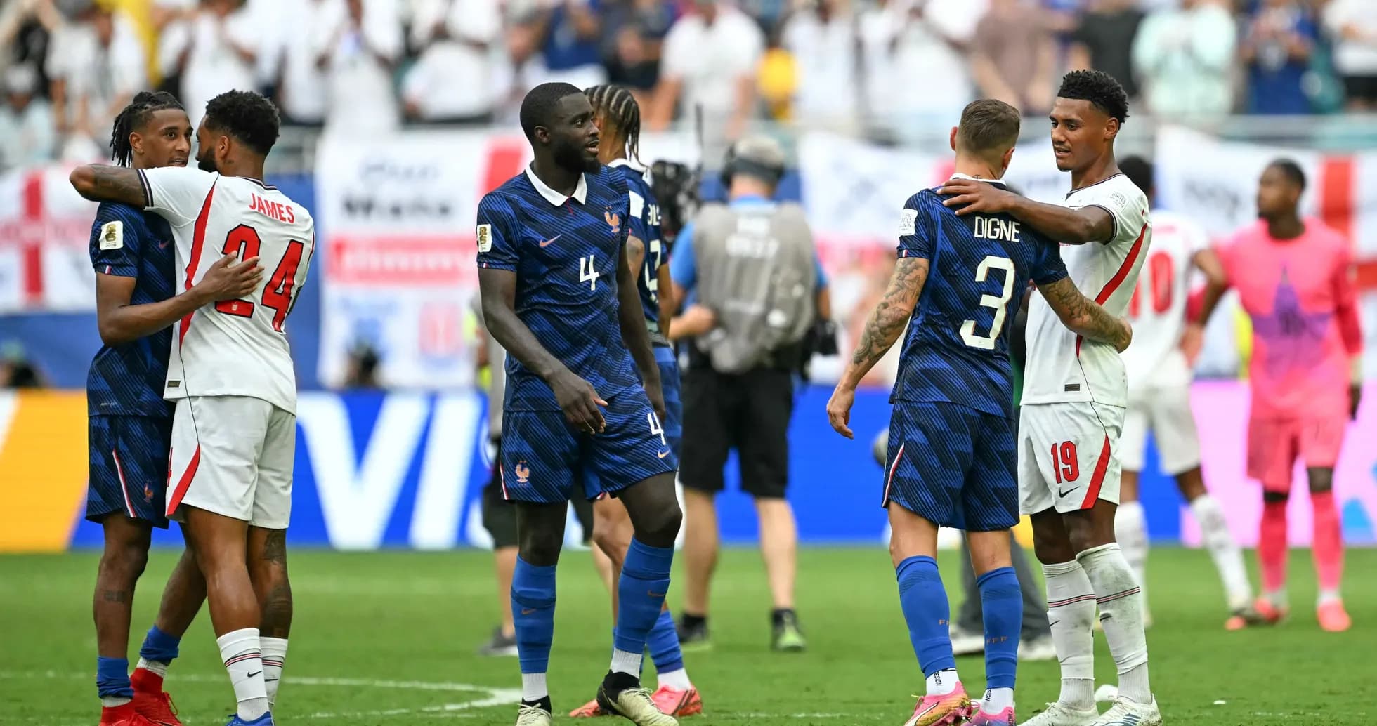 Players from France and England exchanging embraces post-match Players from France and England exchanging embraces post-match